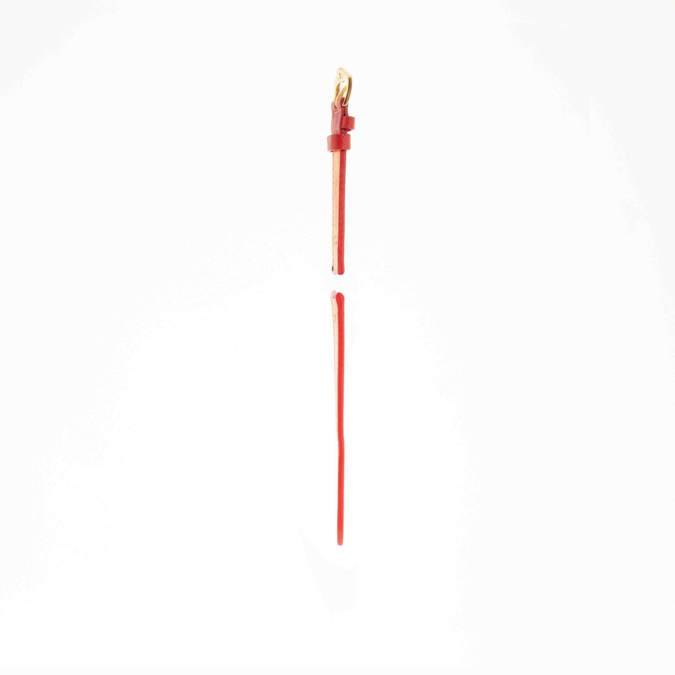 Side profile of Red Hammered Calfskin strap showing red edges and tan underside, crafted by Milano Straps for premium watches.