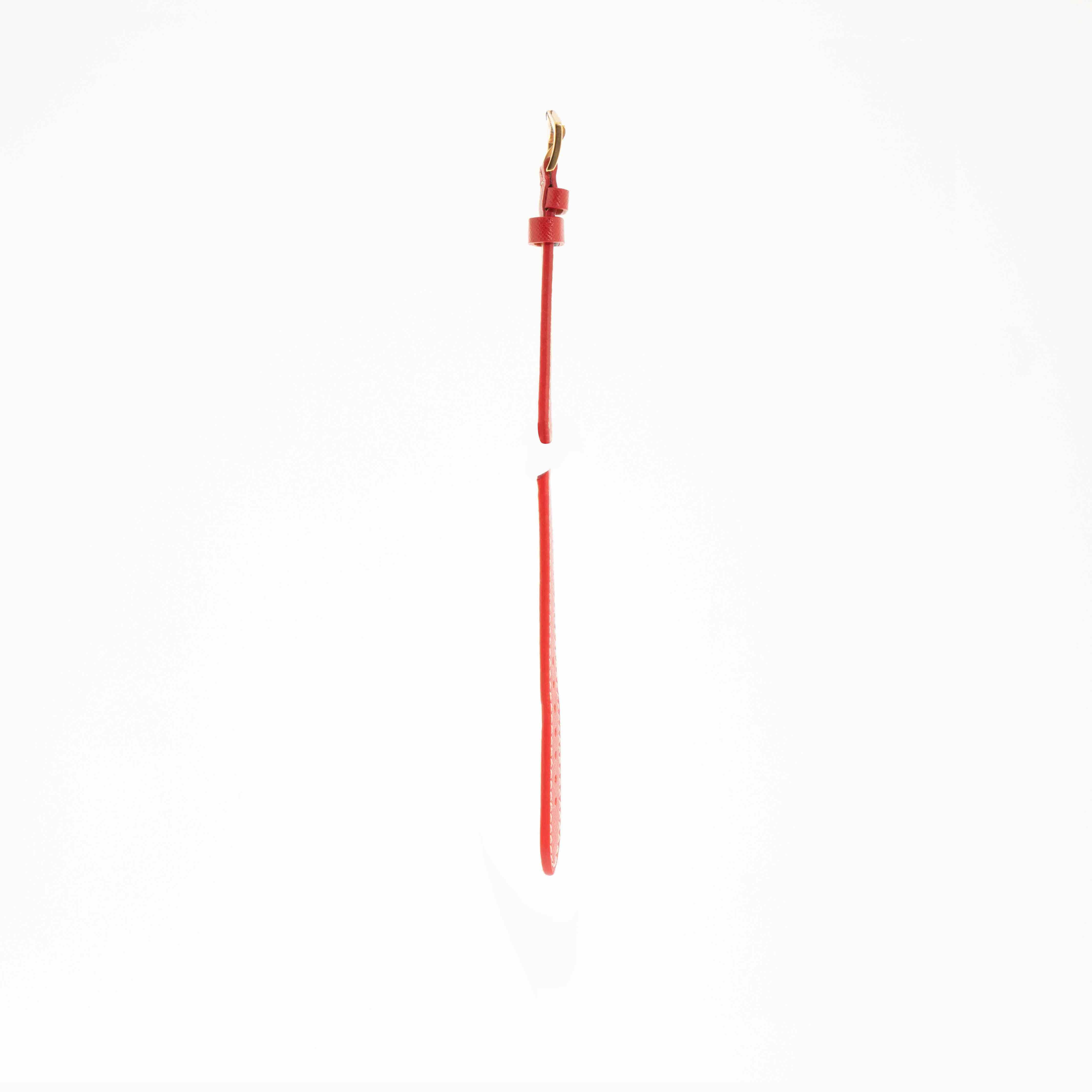 Slim side view of Milano Straps Red Hammered Calfskin strap with ecru stitching, highlighting its refined Italian design.